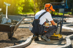 Worker constructing garden